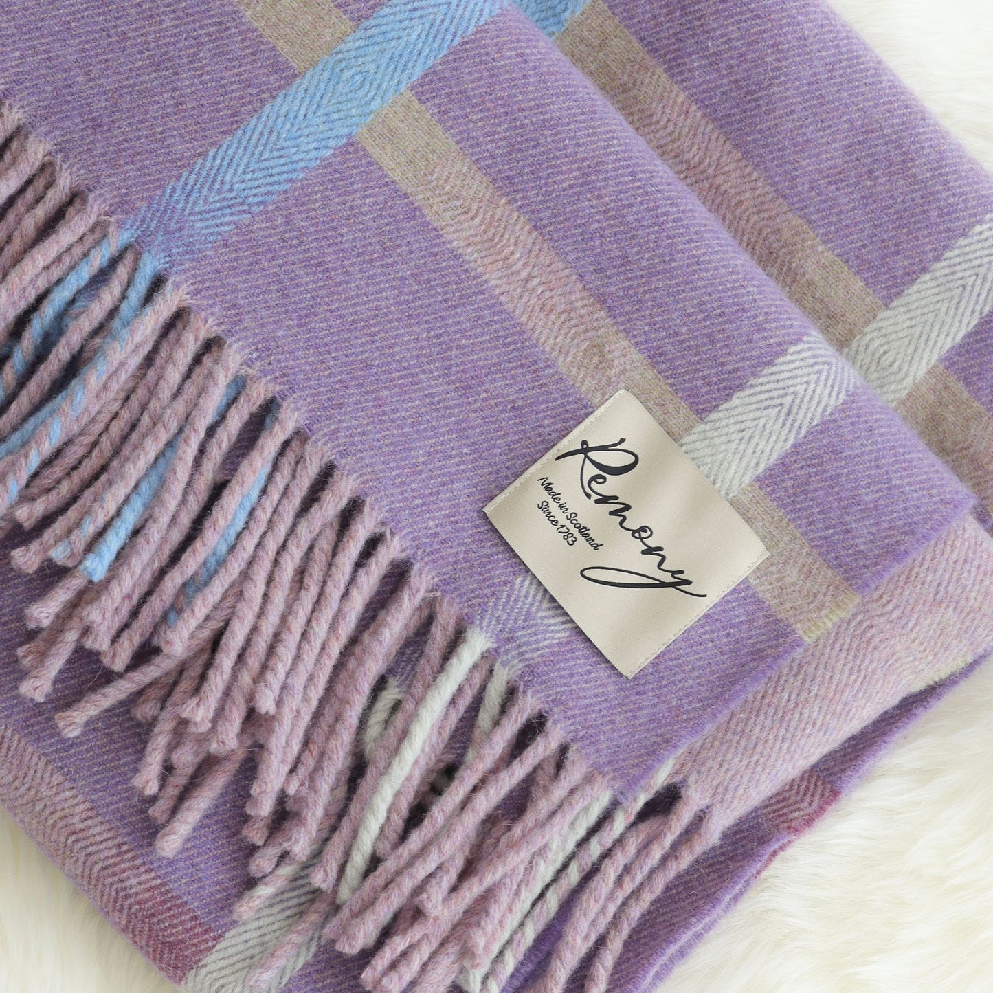 Remony Maree Wool Throw in Amethyst