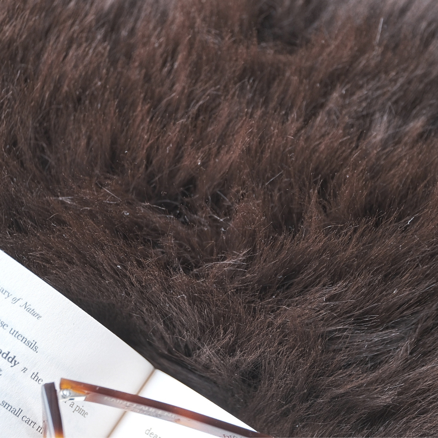 MEDIUM ROUND SHEEPSKIN SEAT PAD IN WHITE OR BROWN